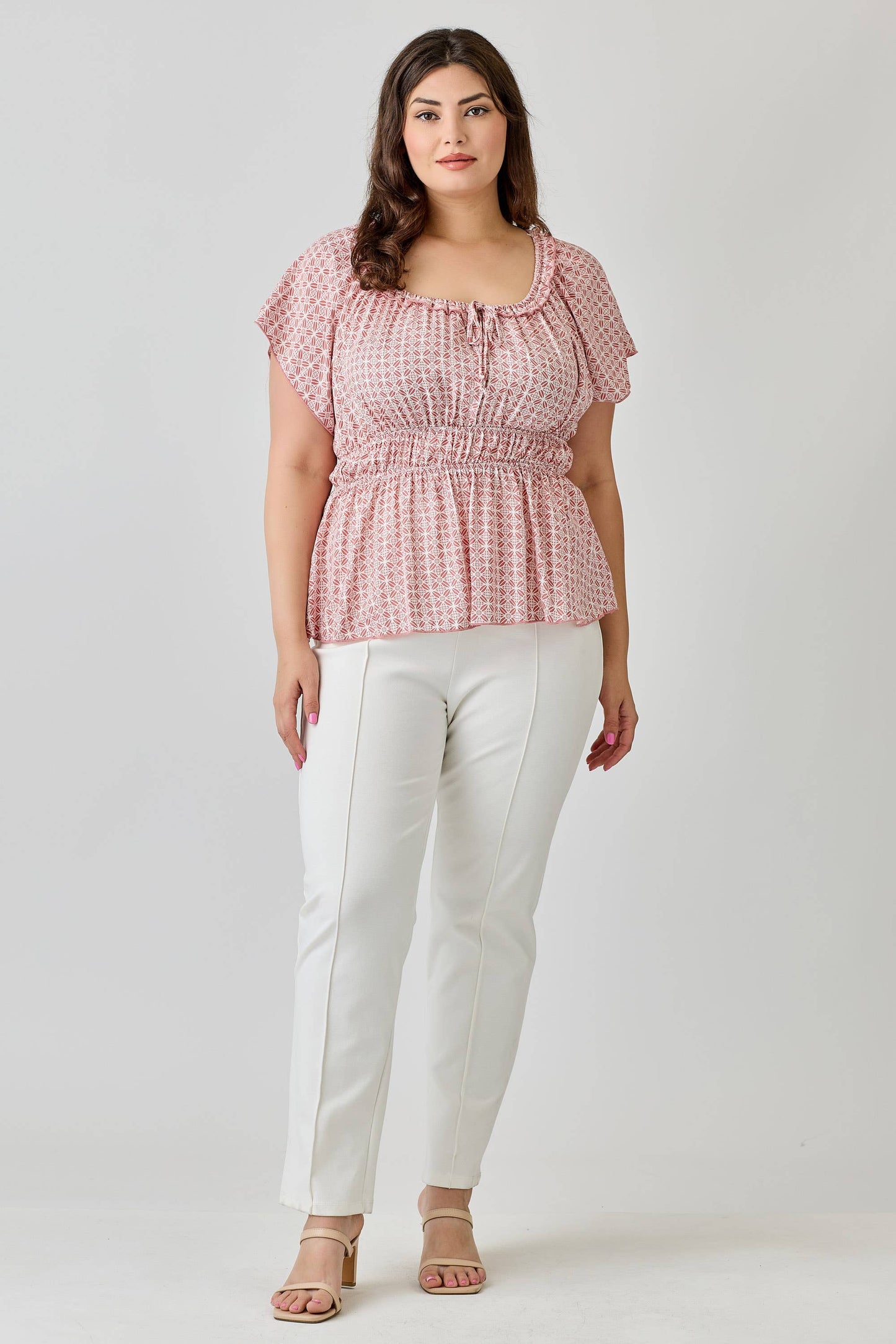 PLUS- Geometric Print Smocked Peplum Top